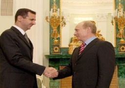 بوتين يهنئ الأسد بقرب التسوية السياسية