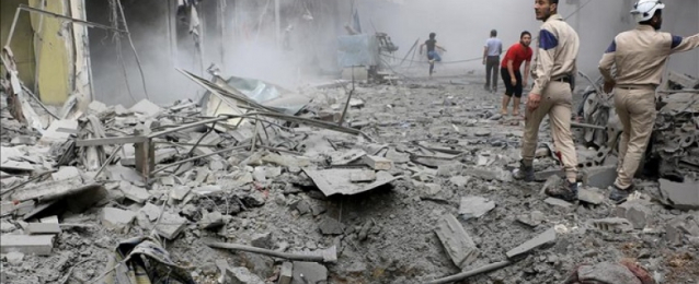 مقتل 14 شخصاً فى قصف جوى وصاروخى على “البوكمال” بريف دير الزور