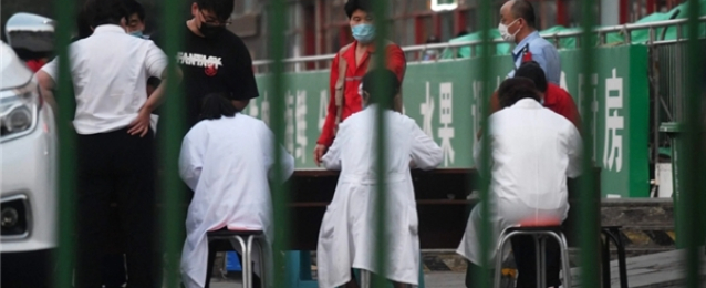 الصين تعزل 10 أحياء أخرى في بكين بعد ظهور إصابات جديدة