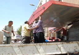 الجيزة تزيل 28 لوحة ضوئية مخالفة ومطاعم ومقاهى متنقلة تحتل الرصيف