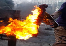 عشرات الإخوان يشعلون النيران في نقطة مرور بشارع فيصل بالجيزة