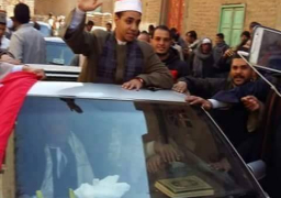 بالصور. أهالى سوهاج يستقبلون أول العالم فى حفظ القرآن بالطبل والمزمار