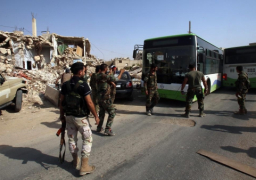 وصول أول حافلتين تقل مقاتلين حي الوعر إلى بلدة الدار الكبيرة بريف حمص الشمالي