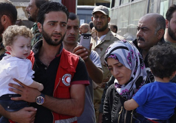 انفجارات في احياء حلب وتعليق عمليات الإجلاء