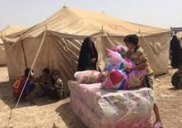 “الهجرة” العراقية توزع مساعدات إغاثية للنازحين فى بغداد والأنبار