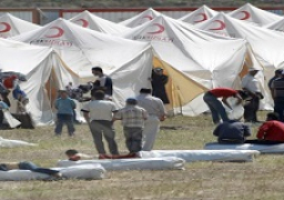 تركيا تقيم مخيمات لإيواء 170 ألفا قرب إدلب السورية