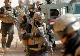 القوات العراقية تقطع بعض الطرق المؤدية إلى ساحة التحرير ببغداد