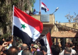 الجيش السورى يرفع العلم فوق مدينة طفس شمال غرب درعا