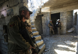 اعتقال متهمة بالإرهاب والعثور على عبوات ناسفة وألغام في الموصل