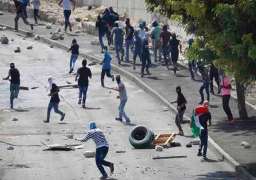 بالصور..مواجهات وإضراب في العيسوية بالقدس احتجاجا على استشهاد فلسطيني