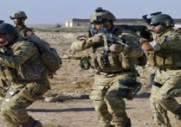 القبض على متهمين اثنين والعثور على مخزن أسلحة غربي بغداد