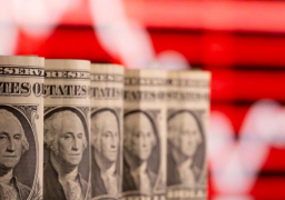 الدولار يتراجع مع تحسن شهية المستثمرين للمخاطرة