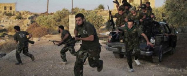 انفجار يقتل 30 من المقاتلين في صفوف الحكومة في إدلب