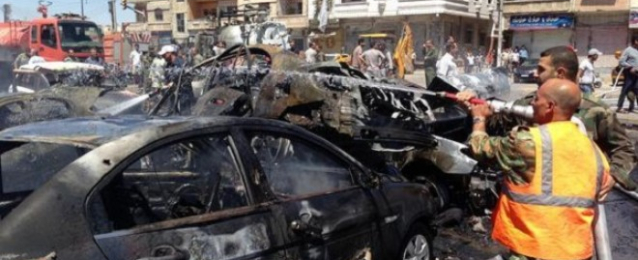 مقتل 17 شخصا فى انفجار سيارتين مفخختين بمدينة “حمص” السورية