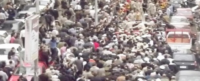 الآلاف يشيعون شهيد الشرطة فى جنازة عسكرية بالبحيرة